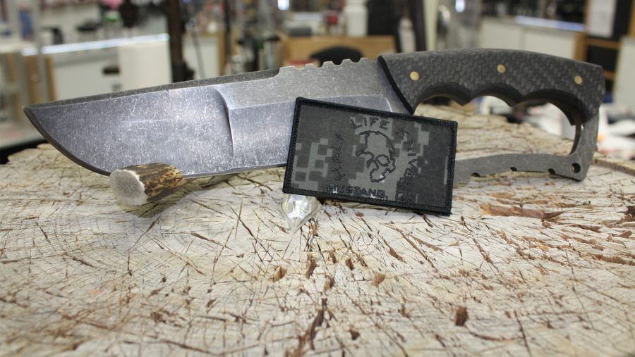 A Knife Featuring a Man's Portrait, representing Artistry in Custom Knife Making in Oklahoma City