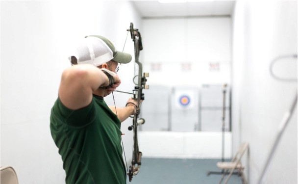 Compact crossbow with scope and stock designed for accurate target shooting